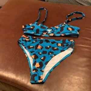 Women’s size M bikini swimsuit.